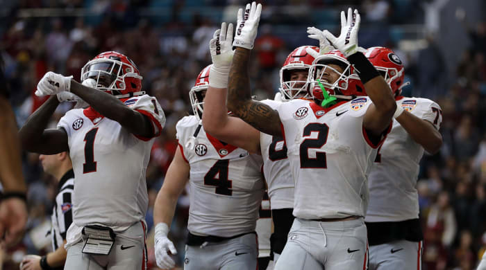 Kendall Milton celebrates a touchdown in the Orange Bowl.